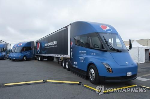 Tesla Begins First Mass Production of 'Semi' Electric Truck for Long-Haul Freight Transport